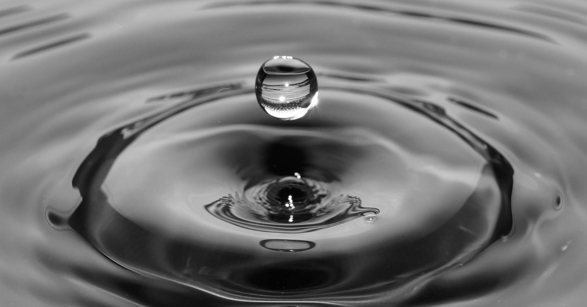 photo of a waterdrop hitting the water