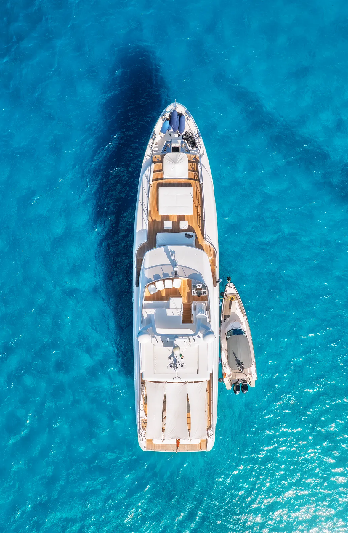 aerial-view-of-luxury-yacht-and-boat-in-blue-sea-i-2025-06-08-11-18-18-utc