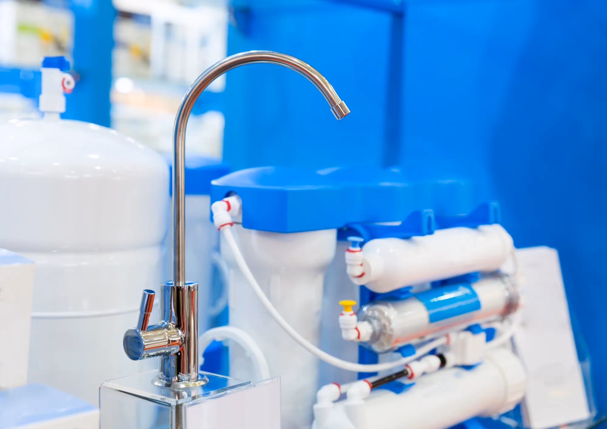 under-counter-reverse-osmosis-filtration-system-echotec-watermakers. Under-counter reverse osmosis filtration system with chrome faucet, pressure tank, and filter housings
